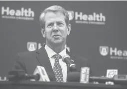  ?? MICHAEL HOLAHAN/AP ?? Georgia Gov. Brian Kemp said MLB “caved to fear and lies from liberal activists” when it yanked the All-Star Game from Atlanta’s Truist Park.