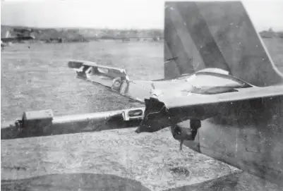  ??  ?? Their close air support made missions extremely dangerous. This photo shows how close the enemy guns came to taking the aircraft out. The stripes on the tail show that it was a 530th ship. This is Lt. Leonard Reeve’s aircraft during an air battle over Nanking. (Photo courtesy Norm Reichard)