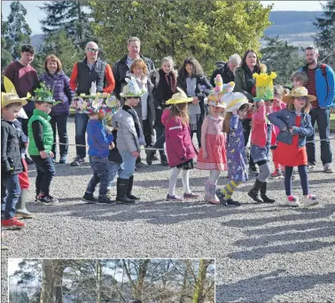  ??  ?? Under sevens take part in the Easter bonnet parade.