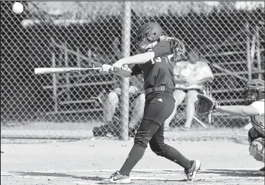  ?? Cliff Grassmick / Staff Photograph­er ?? Lyons’ Gyli Hay smacks a fly ball to the outfield during the team’s Class 3A home quarterfin­al game against Brush on Thursday afternoon. The Lions lost, 9-1, and finished the season 14-4.