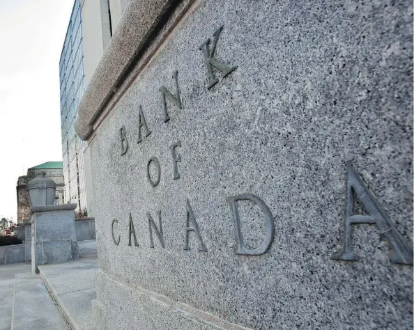  ?? GEOFF ROBINS/AFP/GETTY IMAGES FILES ?? The Bank of Canada has noted Wednesday that recent developmen­ts have reinforced its view that higher rates will be warranted to keep inflation near its target. It added that it will take a gradual approach and be guided by the economic data.