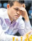  ?? FOTO: DPA ?? Auch Schachwelt­meister Magnus Carlsen spielt derzeit digital.