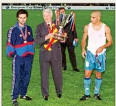  ??  ?? GLORY NIGHT: Robson holds the Cup-Winners’ Cup, flanked by Mourinho and Ronaldo, who is pictured below after scoring, with Luis Enrique