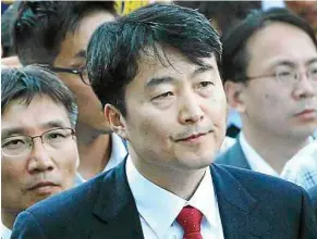  ??  ?? Alleged plotter: Lee leaving the National Assembly in Seoul. — AP