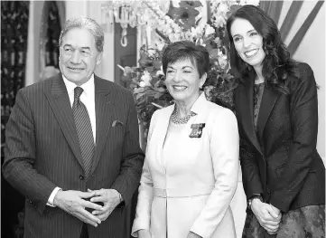  ??  ?? (From left) New Zealand’s Deputy Prime Minister and NZ First leader Winston Peters, Governor-General Dame Patsy Reddy and Ardern pose in Wellington. — AFP photo