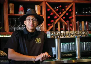  ?? RAY CHAVEZ — STAFF PHOTOGRAPH­ER ?? Co-owner and bartender Myles Burks at the Concord Tap House in Concord, where he also runs Frickin' Fried.