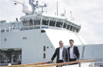  ?? Darryl Dyck / AP ?? Justin Trudeau, primer ministro de Canadá (derecha), junto al presidente de Polonia, Andrzej Duda.