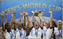  ?? ALESSANDRA TARANTINO — THE ASSOCIATED PRESS FILE ?? The U.S. Soccer Federation reached milestone agreements to pay its men’s and women’s teams equally, making the American national governing body the first in the sport to promise both sexes matching money.