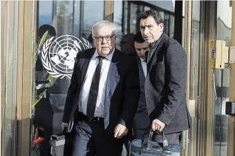  ?? SALVATORE DI NOLFI THE ASSOCIATED PRESS ?? Russia’s Deputy Foreign Minister Sergei Vershinin, left, leaves the European headquarte­rs of the United Nations in Geneva on Monday after a meeting with officials for talks on the Black Sea Grain Initiative.