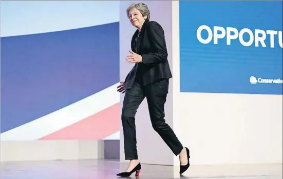  ?? JEFF J MITCHELL / GETTY ?? La primera ministra británica, Theresa May, salió al escenario bailando al son de Dancing queen, la famosa canción de Abba