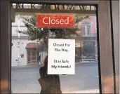  ??  ?? Many of the tasting rooms in downtown Napa were closed Wednesday, while a handful remained open for business despite smoky air blanketing the area.