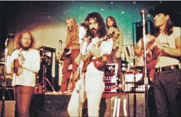  ?? Magnolia Pictures ?? FRANK ZAPPA with the Mothers of Invention in “Zappa,” which taps archives to explore an outsize legacy.