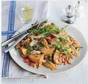  ??  ?? Spice up leftover cooked potatoes with flaked fish, creamy harissa dressing and rocket leaves for a tasty no-cook dish.