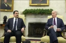  ?? Alex Brandon/Associated Press ?? President Joe Biden meets with Iraq’s Prime Minister Shia al-Sudani on Monday in the Oval Office of the White House.