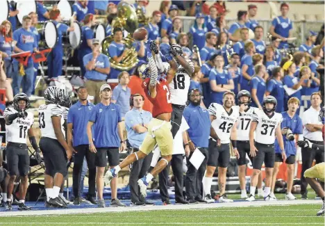  ?? JOEY JOHNSON, TULSA WORLD ?? Tulsa Golden Hurricane cornerback Travon Fuller (2) knocks down a pass intended for Memphis Tigers wide receiver Eddie Lewis (18) during a game against Memphis at Tulsa on October 9, 2021.