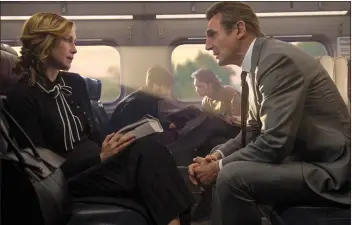  ?? JAY MAIDMENT/LIONSGATE VIA AP ?? This image released by Lionsgate shows Vera Farmiga, left, and Liam Neeson in a scene from “The Commuter.”