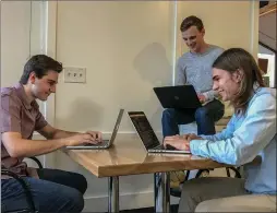  ?? Courtesy of Pulse ?? From left, Saugus High School alum Drake Hougo, Sean O’Bannon and Andrew Quirk work together in Tresidder Union at Stanford on Friday. The three Stanford students have developed an app called Pulse in an attempt to connect citizens with their elected...