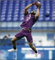  ?? JOE ROBBINS / GETTY IMAGES ?? This year the victim of this flawed NFL combine interview system was former Texas cornerback Kris Boyd, reportedly asked by one team if he had both of his testicles.