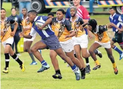  ??  ?? LEADING THE PACK: Westview centre Rasheed Roboshi goes on a run in their rugby match against Gamble High