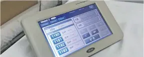  ?? Photo: Kogo Fujiki ?? The electronic console that doctors use to call patients from the consultati­on rooms.