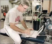  ?? Kari Rene Hall Los Angeles Times ?? AS AN ANGELS first base coach, Joe Maddon embraced analytics, compiling numbers on a daily worksheet on his laptop.