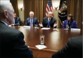  ?? CAROLYN KASTER — THE ASSOCIATED PRESS FILE ?? In this file photo, President Donald Trump speaks in the Cabinet Room of the White House, in Washington, during a meeting with members of congress to discuss school and community safety.