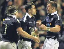  ??  ?? ■ Sean Maitland (centre) celebrates his try against Argentina yesterday.