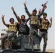  ?? AHMAD AL-RUBAYE/AFP/GETTY IMAGES ?? Pro-government forces will attack Fallujah, Iraq, which has been under Daesh control for about two years.