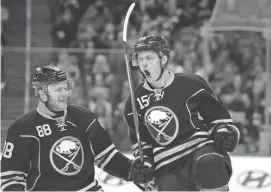  ?? GARY WIEPERT/AP ?? Sabres center Jack Eichel, right, seen alongside Jamie McGinn during a game last season, said he has plenty to prove after “two mediocre seasons.”