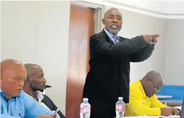  ?? Picture: LULAMILE FENI ?? TIME FOR ACTION: Contralesa provincial chairman Chief Mwelo Nonkonyana discusses forming a new political party. At the meeting are, from left, Contralesa secretary-general Chief Xolile Ndevu, AmaXhosa King Mpendulo Sigcawu and, right, provincial...