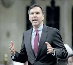  ?? ADRIAN WYLD/ THE CANADIAN PRESS ?? Finance Minister Bill Morneau is threatenin­g to take the Conservati­ves to court over an insinuatio­n by Tory finance critic Pierre Poilievre.