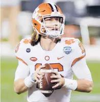  ?? JAREDC. TILTON/GETTY ?? QBTrevor Lawrence is 2-0 in theCFPsemi­finals, having ledClemson to the national championsh­ip two years ago.