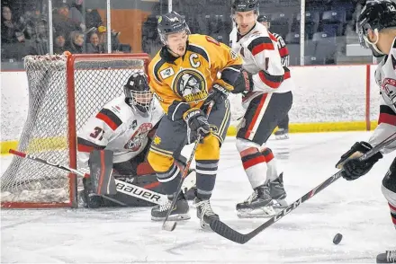  ??  ?? Yarmouth Mariners captain Matt Barron positions himself in front of the Pictou net in the team’s last regular season game on March 7. In his last year with the team Barron broke and set three regular season Mariners franchise records for most games played, most assists and most points.