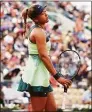  ?? Ryan Pierse / Getty Images ?? Naomi Osaka after losing to Amanda Anisimova at the French Open on Monday in Paris.