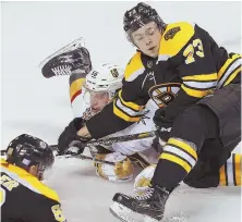  ?? STAFF FILE PHOTO BY MATT STONE ?? KEEPING BUSY: Charlie McAvoy has gotten plenty of time on the ice during his rookie season with the Bruins.