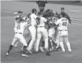  ?? KEVIN JAIRAJ/USA TODAY SPORTS ?? The Dodgers celebrate winning the World Series against the Rays.