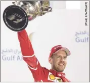  ??  ?? Avec ce succès, Sébastian Vettel prend, seul, les commandes du championna­t du monde.