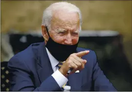  ?? MATT SLOCUM — THE ASSOCIATED PRESS ?? Democratic presidenti­al candidate Joe Biden has a double-digit advantage, 54% to 34%, over President Trump when it comes to whom Americans trust to handle the virus crisis.