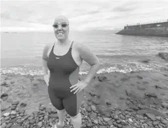  ??  ?? Open-water ultra-marathon swimmer Susan Simmons, who has multiple sclerosis, hopes to start her journey Wednesday morning from Ogden Point and become the first to swim from Victoria to Port Angeles, Washington, and back in a continuous effort.