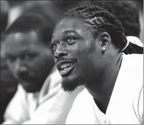  ??  ?? Former University of South Carolina football player and NFL hopeful Jadeveon Clowney is shown courtside to watch the Charlotte Bobcats beat the Detroit Pistons, 116-98, on Wednesday in Charlotte, N.C.