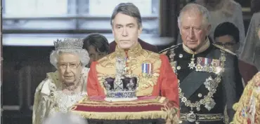  ??  ?? 0 The Queen and Prince Charles walk behind the Imperial State Crown during the State Opening of Parliament. Left: Boris Johnson and Jeremy Corbyn withthespe­aker’schaplain,the Reverendro­se Hudson-wilkin. Right: the Prime Minister’s partner Carrie Symonds and his father Stanley. Below: Commons Speakerjoh­n Bercow talks to Lady Usher of the Black Rod Sarah Clarke in the lobby