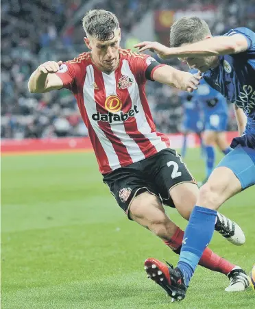  ??  ?? Sunderland right-back Billy Jones defends against Leicester midfielder Andy King. Picture by Frank Reid