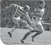  ??  ?? Donnie Mackinnon challenges Jimmy Johnstone at Celtic Park in 1966