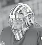  ?? RONALD MARTINEZ/GETTY IMAGES ?? A detailed view of Nicole Hensley's mask for Team USA.