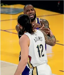  ?? AP ?? LeBron James and Kiwi centre Steven Adams exchange words at the Staples Center yesterday.
