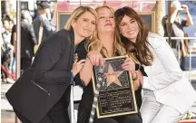  ?? RICHARD SHOTWELL/INVISION/AP PHOTO BY ?? Actress Christina Applegate (center) poses with “Dead to Me” creator Liz Feldman (left) and her “Dead to Me” co-star Linda Cardellini during a ceremony honoring Applegate with a star on the Hollywood Walk of Fame on Nov. 14, 2022, in Los Angeles.