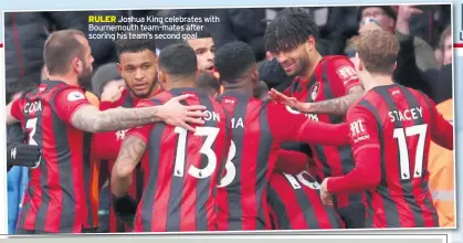  ??  ?? RULER Joshua King celebrates with Bournemout­h team-mates after scoring his team’s second goal