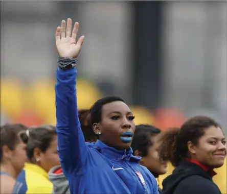  ?? REBECCA BLACKWELL - THE ASSOCIATED PRESS ?? FILE - In this Aug. 10, 2019, file photo, Gwendolyn “Gwen” Berry of the United States waves as she is introduced at the start of the women’s hammer throw final, during athletics competitio­n at the Pan American Games in Lima, Peru.