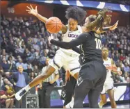  ?? Stephen Dunn / Associated Press ?? UConn’s Christyn Williams (13) is fouled by Vanderbilt’s Cierra Walker (10) during the second half on Saturday.