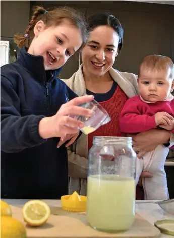  ?? Photo: Bev Lacey ?? WITH HEART: Lucy Anderson with her mother Jessica and sister Alice. Lucy’s Lemonade Stand will be operating on Sunday to raise funds for drought-affected farmers.